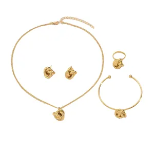 Elegant 4-piece gold jewelry set with twisted knot necklace, ring, earrings and bangle