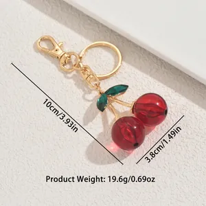 Geometric cherry keychain with red resin charms and gold metal ring for women