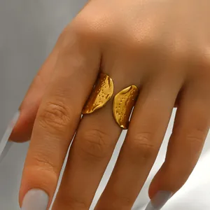 Elegant gold-plated geometric twisted ring with textured surface for women