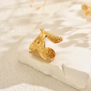 Minimalist gold adjustable ring with irregular crumpled texture and artistic organic form