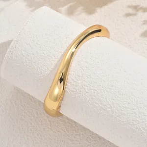 Minimalist 18k gold plated geometric chunky bangle with a polished finish and hinge closure