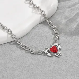 Hip-hop heart pendant necklace with red gemstone and silver thorn frame on a thick chain