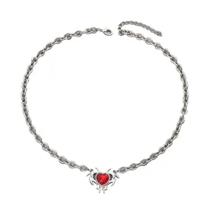 Y2K gothic silver chain necklace with a sharp tribal red heart rhinestone pendant
