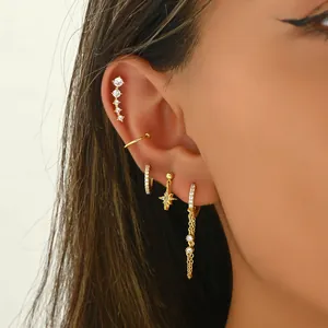 Gouden 5-delige ster oorbellen set met zirkonia voor een gelaagde franse luxe uitstraling