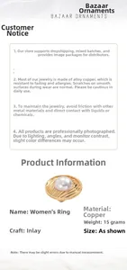 Detail showing wavy gold-plated copper ring inlaid with a large central pearl, 15g weight
