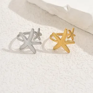 Minimalist starfish open ring set in gold and silver finish with detailed sea texture