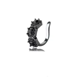 Detail of U-shaped black zircon ear cuff showing dark plating and micro-pave crystals