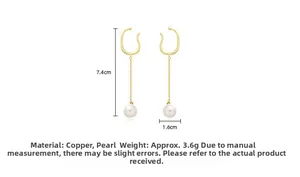 Detail view of pearl drop ear cuffs showing dimensions of 7.4cm height and 1.6cm width