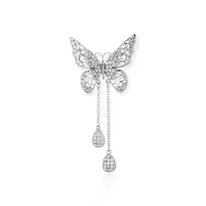 Elegant silver butterfly brooch with hollow design, zircon inlay and tassel pendants