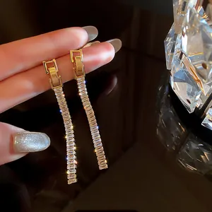Elegant gold-plated 925 silver needle tassel earrings with rectangular zirconia stones
