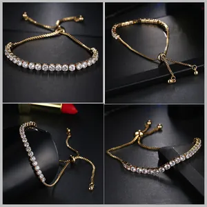 Detailed macro view of adjustable gold bolo tennis bracelet with white zircon stones