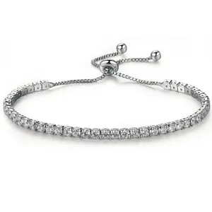 Adjustable silver tennis bracelet with cubic zirconia stones in a minimalist bolo design