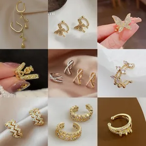 Collection of gold and silver zircon ear cuffs with pearl and butterfly designs
