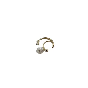 Minimalist gold ear cuff featuring large white pearl and small bead accents for women