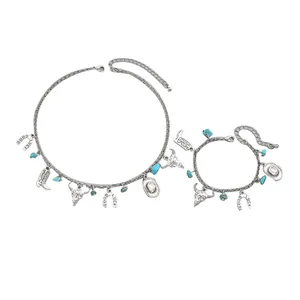 Silver western jewelry set with turquoise, bull skull, and lucky horseshoe charms