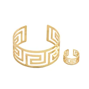 Set gioielli donna oro con bracciale geometrico a greca e anello aperto abbinato