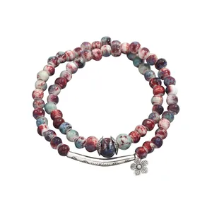 Retro double-layered beaded bracelet with floral charms and marble texture stones