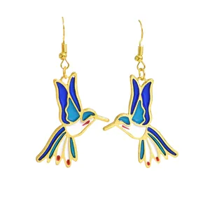 Luxurious hummingbird drop earrings with vibrant blue enamel inlay in gold metal frame