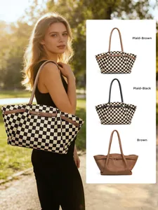 Close-up of checkerboard tote bags featuring leather handles and decorative belt buckles