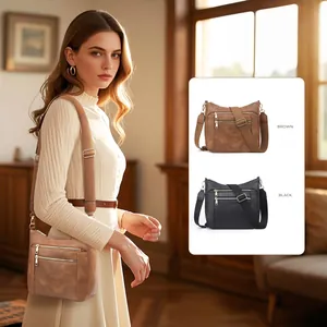 Dettagli della borsa a tracolla vintage a scacchi con zip dorate e tracolla regolabile