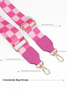 Detail of adjustable pink checkered bag strap with golden buckle and lobster clasp
