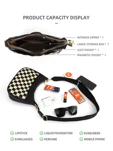 Detail view of checkerboard shoulder bag interior showing pockets and storage capacity