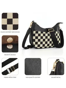 Detail of checkered shoulder bag featuring magnetic buckle and gold hardware accents