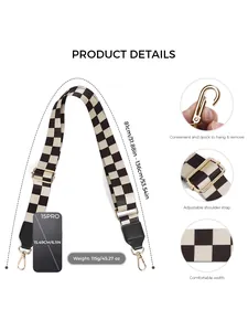 Adjustable black and white checkered bag strap with gold metal hooks and leather trim