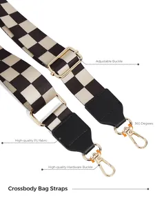 Detail of adjustable checkerboard bag strap with 360-degree gold metal swivel hooks
