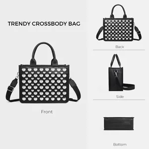 Trendy black PU tote bag with silver metal rivets and adjustable wide strap multi-view