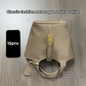 Minimalist PU leather bucket bag in elephant grey with gold lock and size dimensions