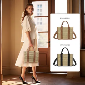 Straw woven tote bag with leather trim and adjustable strap in brown and black