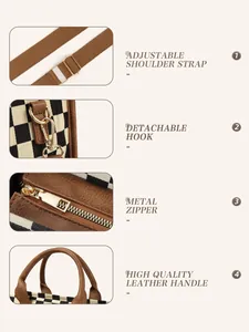 Detail view of adjustable fabric strap, golden hardware, and leather handle on tote bag