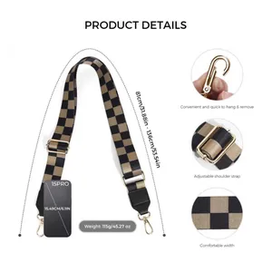 Adjustable brown and black checkerboard wide bag strap with gold metal hooks and hardware