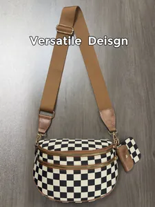 Close-up of checkerboard crossbody bag set with canvas texture and gold metal hardware