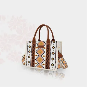 Boho-Canvas-Tragetasche mit geometrischem Muster und braunen Ledergriffen in Frontansicht