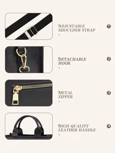 Detail view of gold metal hardware and adjustable shoulder strap on black PU tote bag