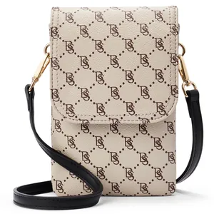 Close-up of cream PU leather phone bag featuring brown B monogram and black strap.