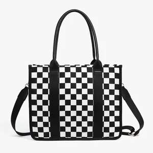 Large checkerboard tote bag with dual handles and adjustable shoulder strap for women