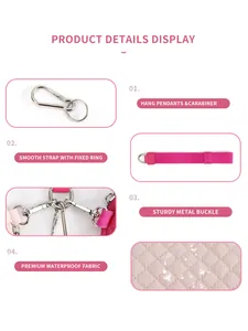 Waterproof quilted fabric detail with metallic buckle and D-ring on pink wristlet bag