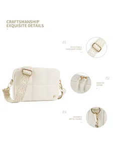 Detail view of cream quilted crossbody bag featuring jacquard strap and gold hardware