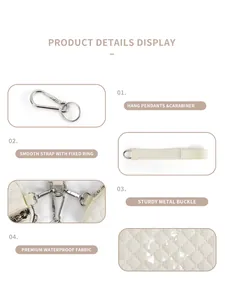 Detail view of water-resistant fabric with durable metal carabiner and secure hook strap