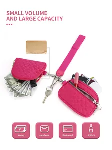 Pink quilted wristlet pouch set showing storage for cards, keys, and accessories