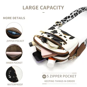 Cow print crossbody bag with 5 zipper pockets and adjustable strap for large capacity
