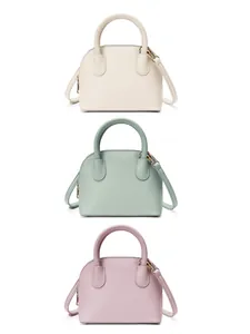 Trois mini sacs à bandoulière en forme de coquille en beige, vert clair et cuir lavande