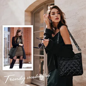 Quilted nylon crossbody bag with black diamond stitching and leopard print wide strap