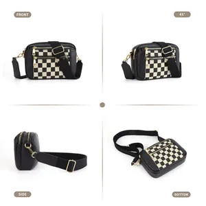 Sac à bandoulière damier noir et blanc avec sangle réglable et fermetures éclair dorées