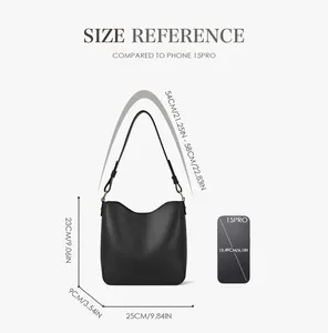 Detailed size comparison of black leather shoulder bag showing dimensions and adjustable strap