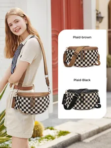 Detail of checkered crossbody bag set with adjustable nylon strap and small pouch