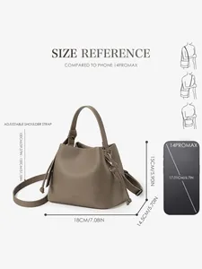 Detailed size guide of earth-toned pebbled leather bucket bag with dimensions and phone reference